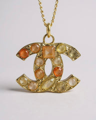 CHANEL Coco Mark Necklace – Orange Yellow Rhinestone Pendant on Gold-Plated Chain