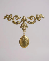 Victorian-Style Small Locket Pin Brooch – Ornate floral monogram design. A delicate piece of timeless charm