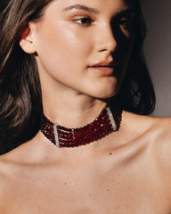 c.1980, A Christian Dior Masterpiece Adorned with Burgundy Crystal Beads, Embodying Timeless Elegance. Crafted in Germany