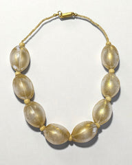Vintage Italian large oval Murano-glass beads with a golden shimmer inside, finished with a gold-tone barrel clasp.