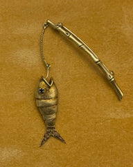 The Angler's Treasure— Rare Blue Sapphire & 14K Yellow Gold Flexible Fish Brooch