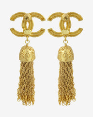 Chanel – Tassel Drop CC Stud Earrings, a gold-plated masterpiece reflecting the essence of French sophistication.