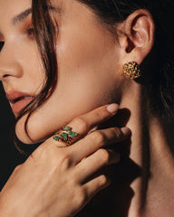 A RARE 'TUTTI FRUTTI' RING, BY CARTIER Featuring Cherry Ruby and Carved Leaf Emerald, c.1940.