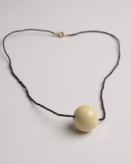 Minimalist Antique Ivory Bead Necklace with Black Seed Murano Strand