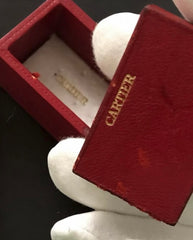 A RARE 'TUTTI FRUTTI' RING, BY CARTIER Featuring Cherry Ruby and Carved Leaf Emerald, c.1940.