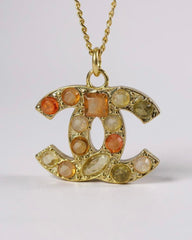 CHANEL Coco Mark Necklace – Orange Yellow Rhinestone Pendant on Gold-Plated Chain