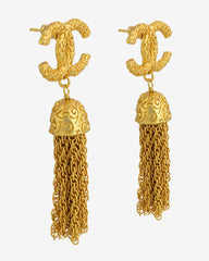 Chanel – Tassel Drop CC Stud Earrings, a gold-plated masterpiece reflecting the essence of French sophistication.
