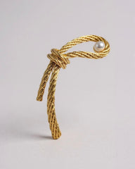 Sophisticated Statement Brooch— Golden Bow with Classic Pearl