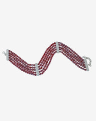c.1980, A Christian Dior Masterpiece Adorned with Burgundy Crystal Beads, Embodying Timeless Elegance. Crafted in Germany
