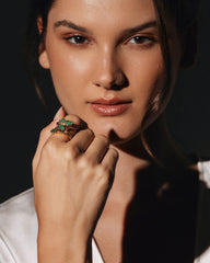 A RARE 'TUTTI FRUTTI' RING, BY CARTIER   Featuring Cherry Ruby and Carved Leaf Emerald, c.1940.